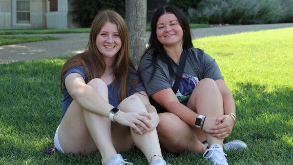 Students on grass at move-in